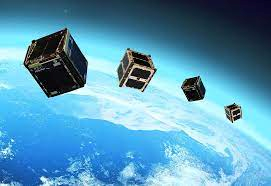Mini satellites performing maneuvers in space